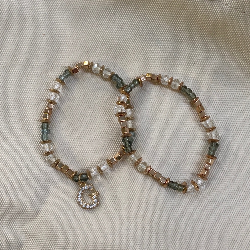 2 bracelets with multi colored beads